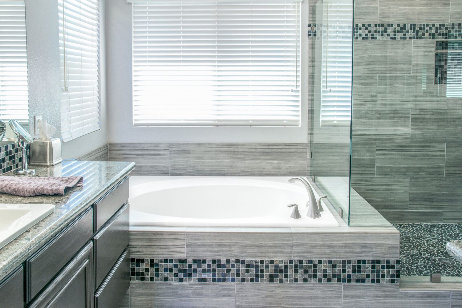A bathtub that has been deep cleaned, it is white and spotless.