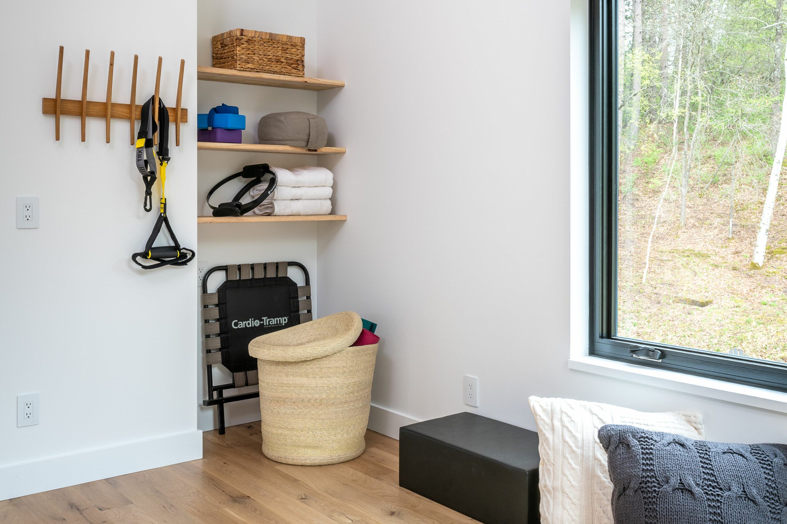 Innovative Storage Solutions for a Clutter-Free Home Gym”, by Oasis Away