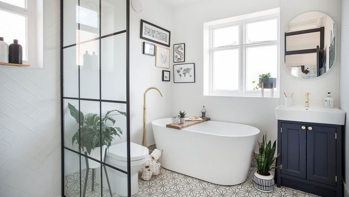 A bathroom with affordable ceramic tiling.