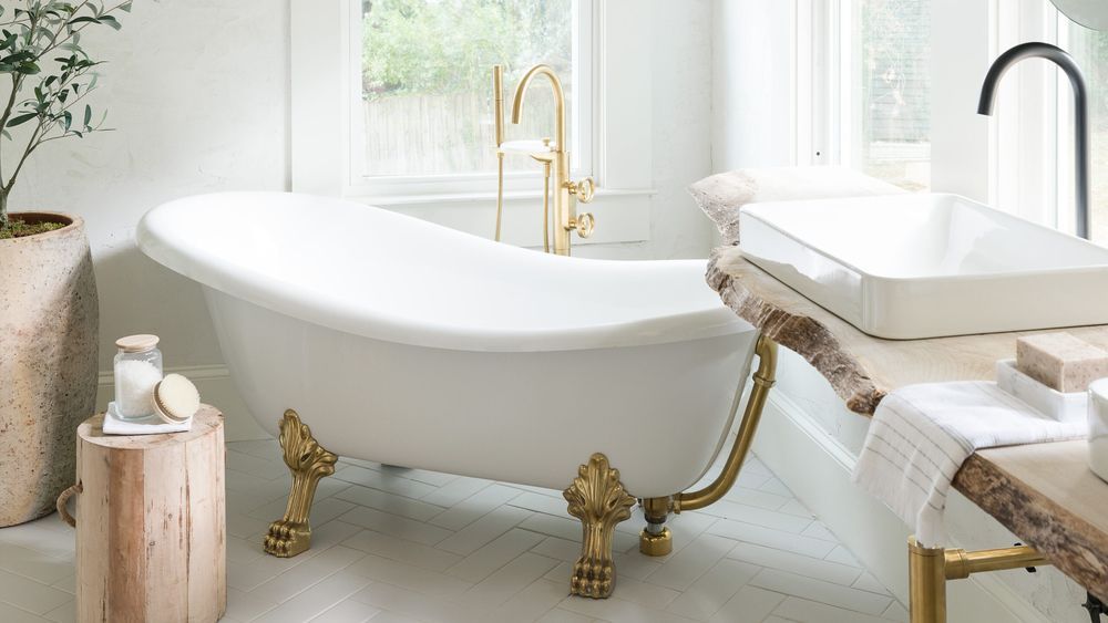 White bathroom with tile flooring