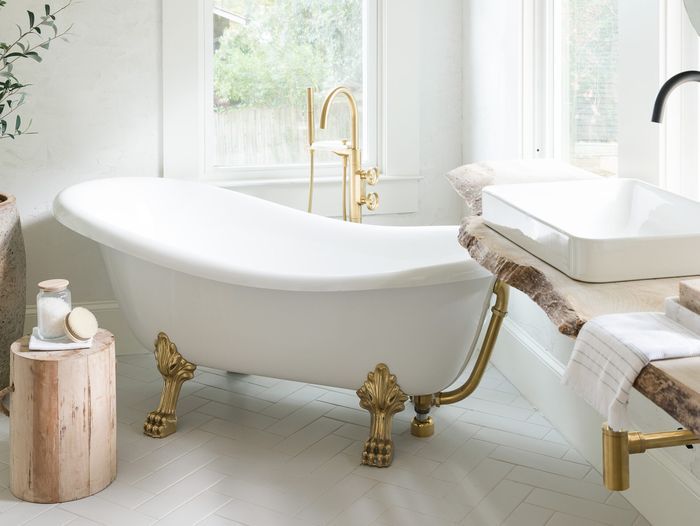 White bathroom with tile flooring