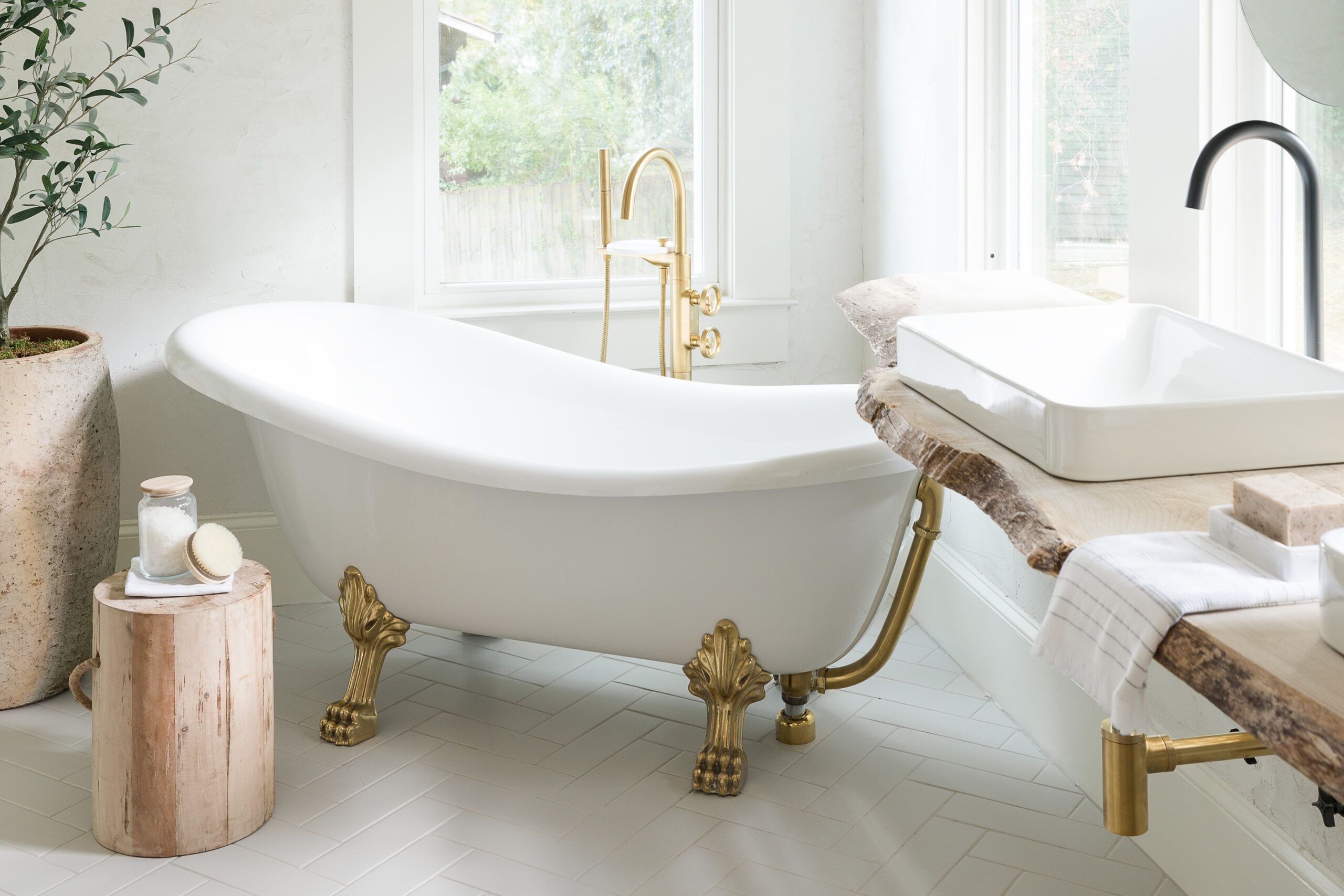 White bathroom with tile flooring