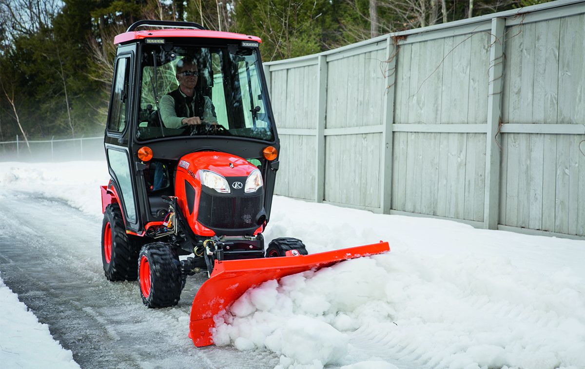 Small lawn tractor with snow online blade