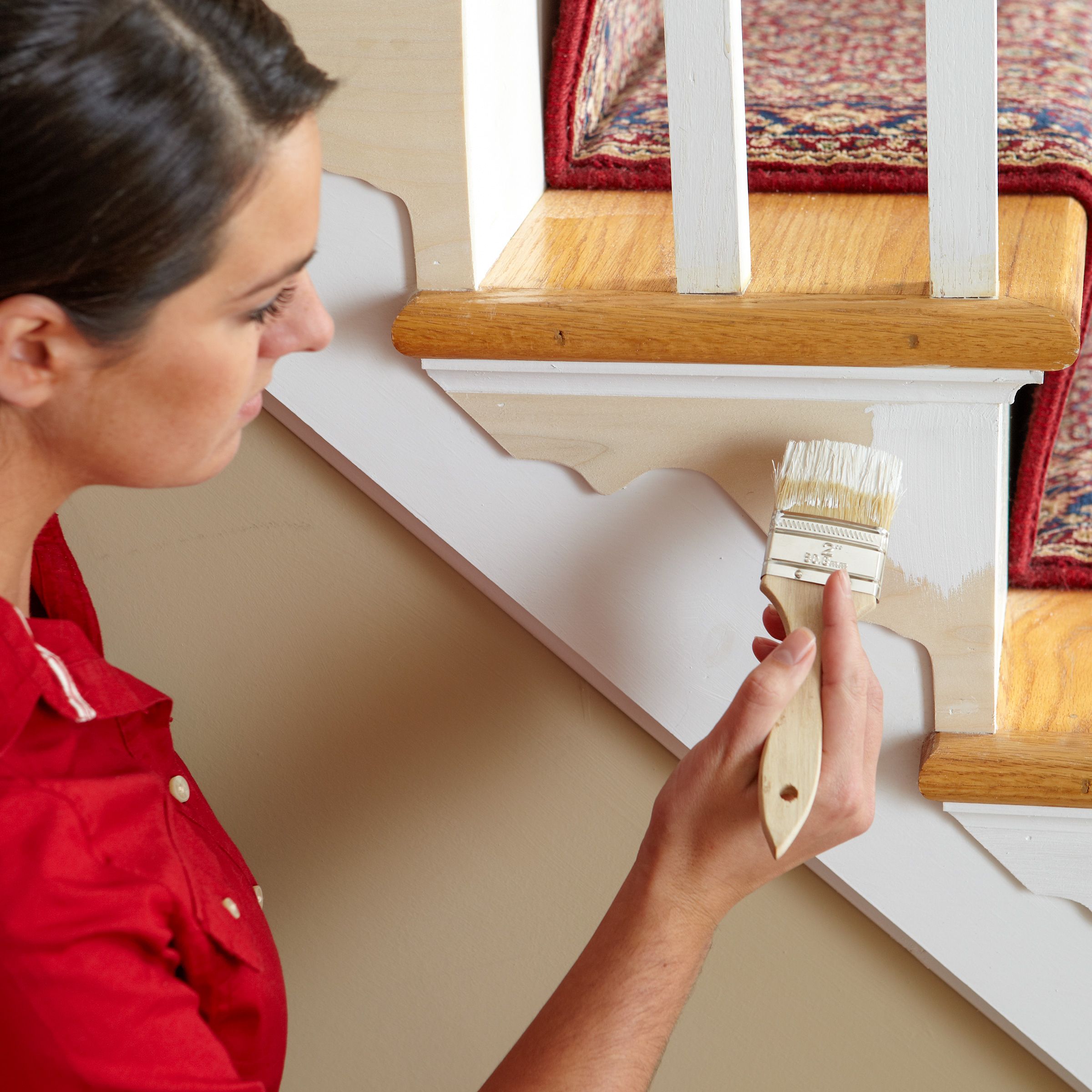 painting the stair bracket to match the color of the side of the stairs