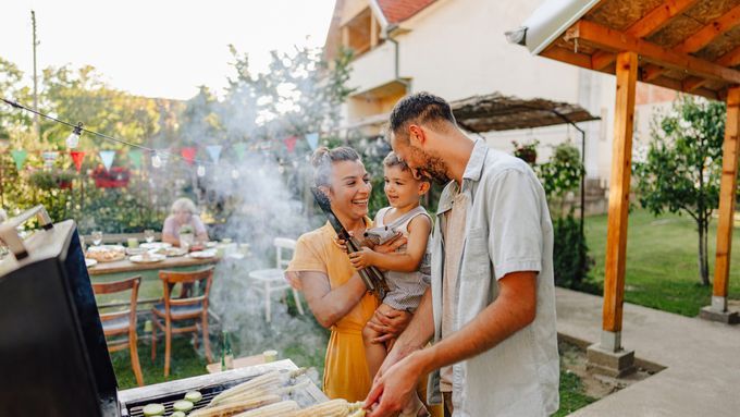 grilling in the backyard during a party