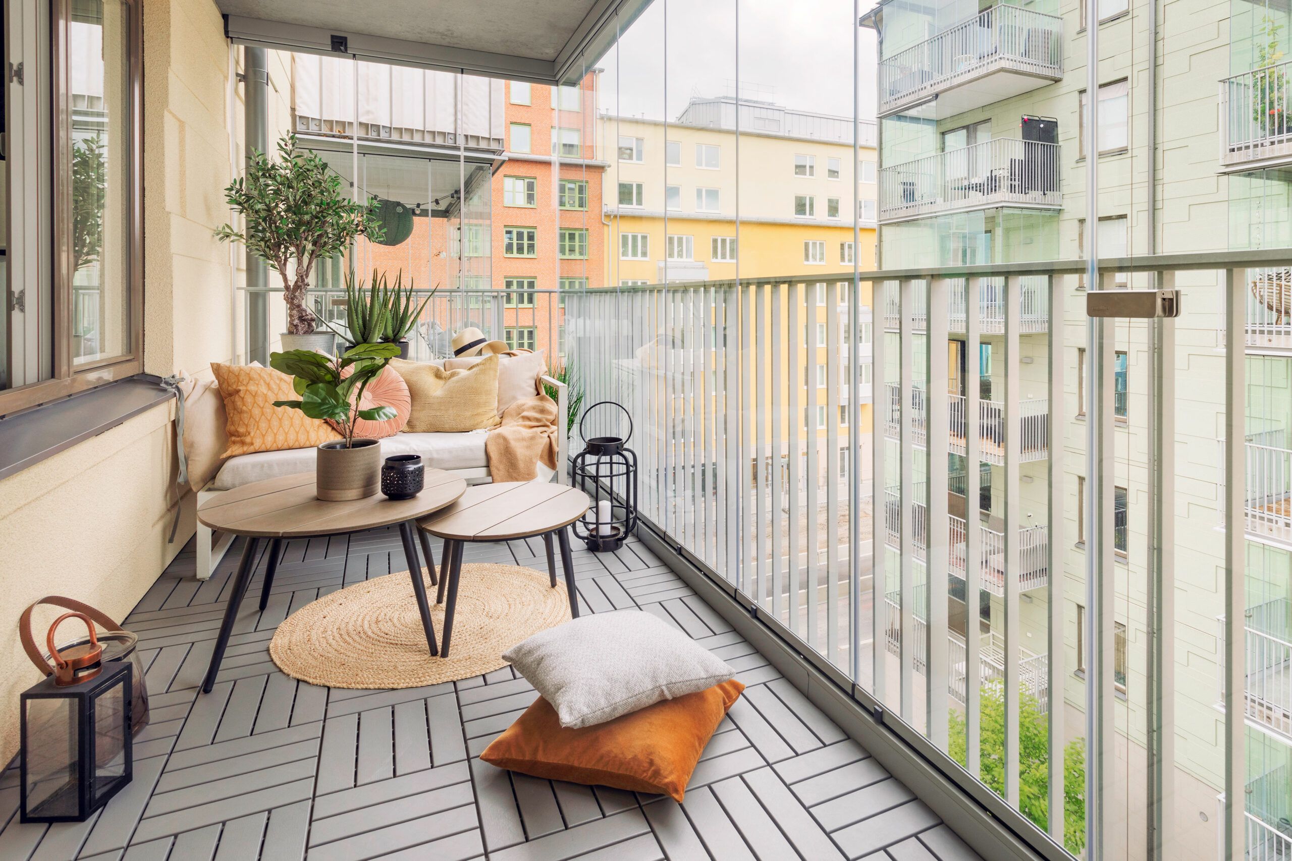 Image of a balcony with flooring installed on top, which is a great way to transform the look of your balcony