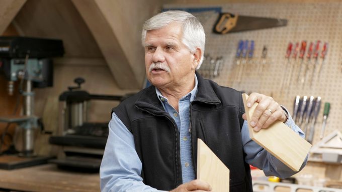 Tom silva holding up a wood joint.