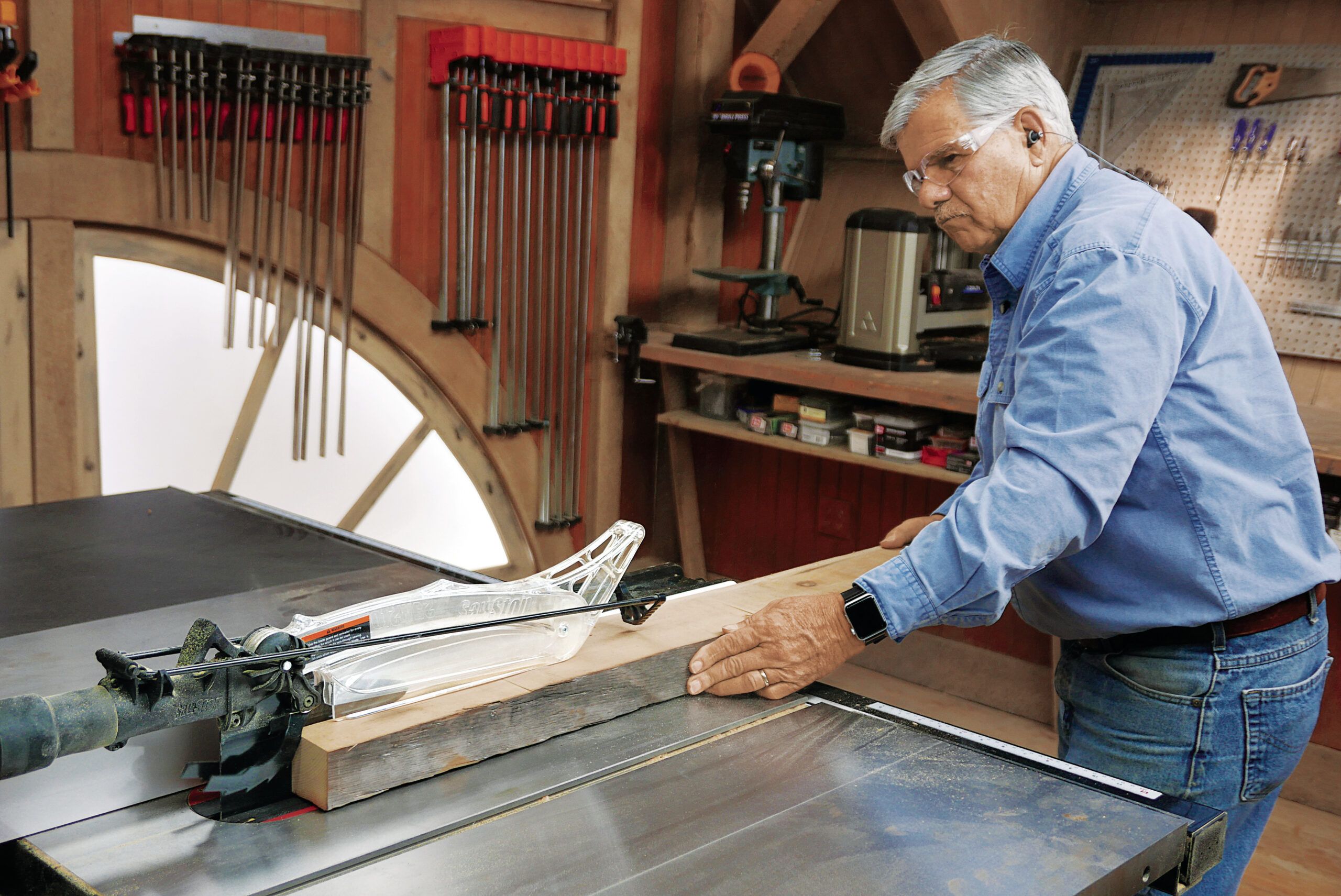 Tom Silva cutting the pieces to size.