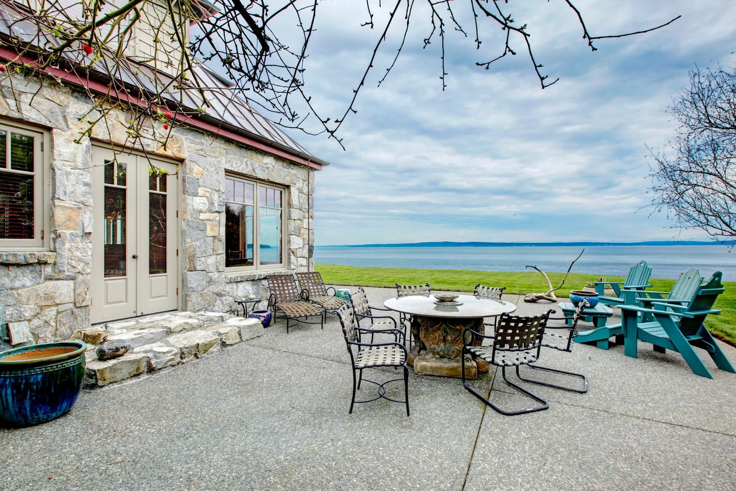 a patio with refurbished outdoor furniture