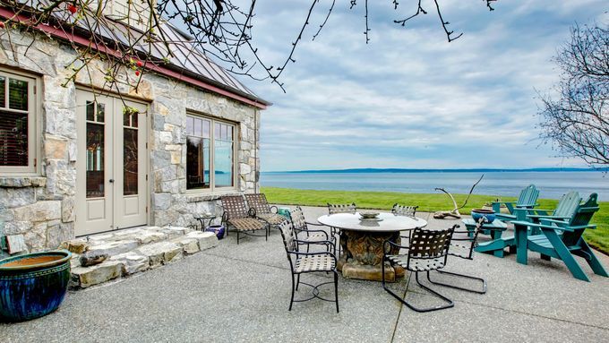 a patio with refurbished outdoor furniture