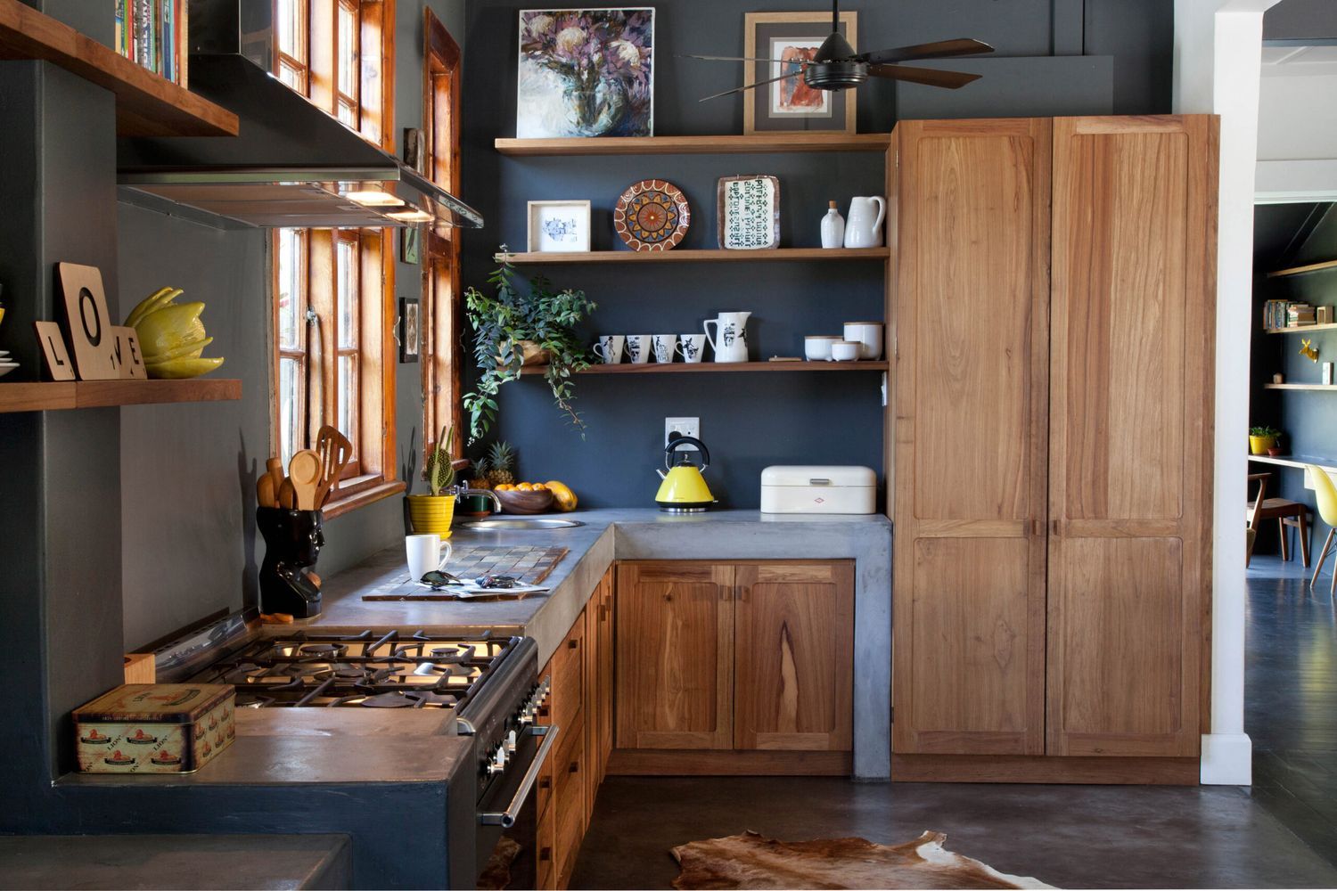 Contemporary kitchen with concrete countertops.