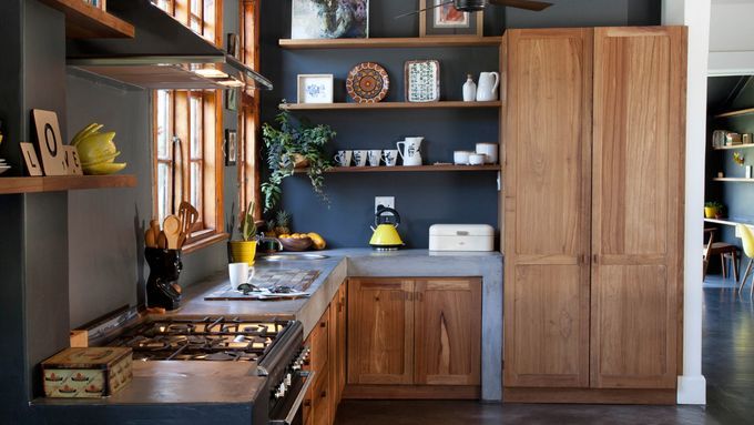 Contemporary kitchen with concrete countertops.