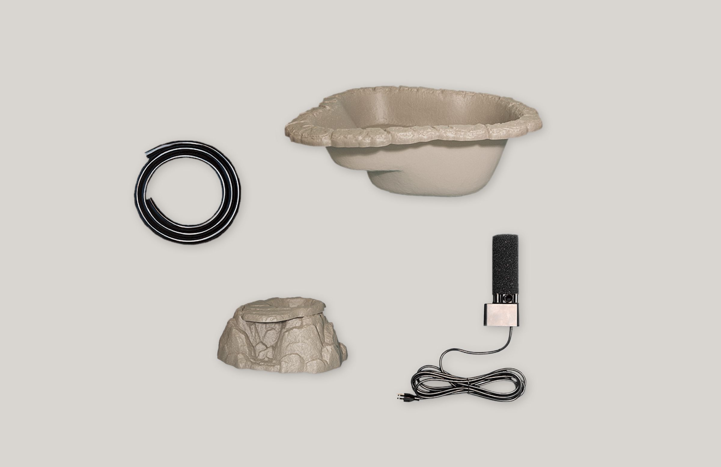 An image of several essential components for backyard pool construction, including a pump, rocks, and a liner.