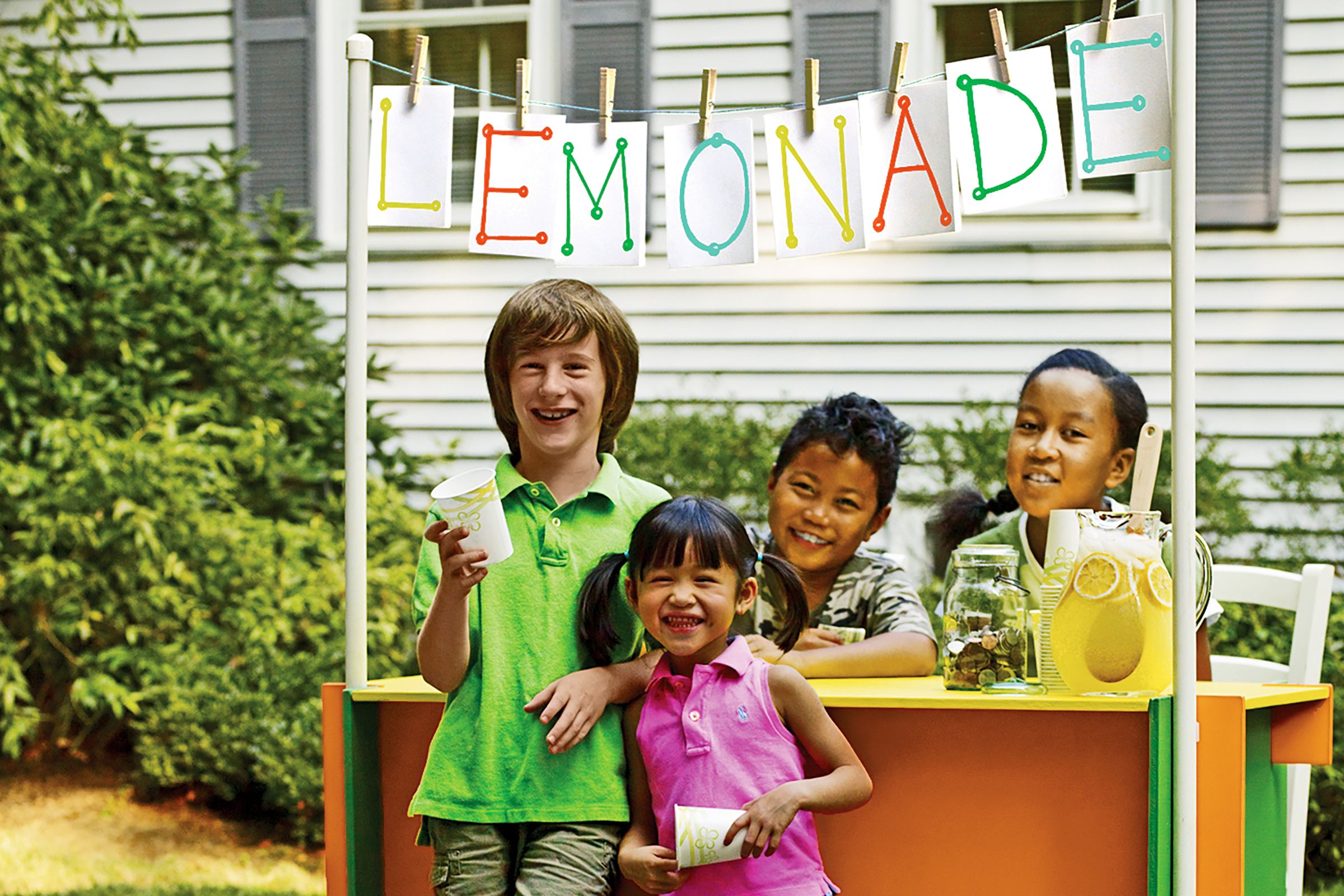 a lemonade stand with kids