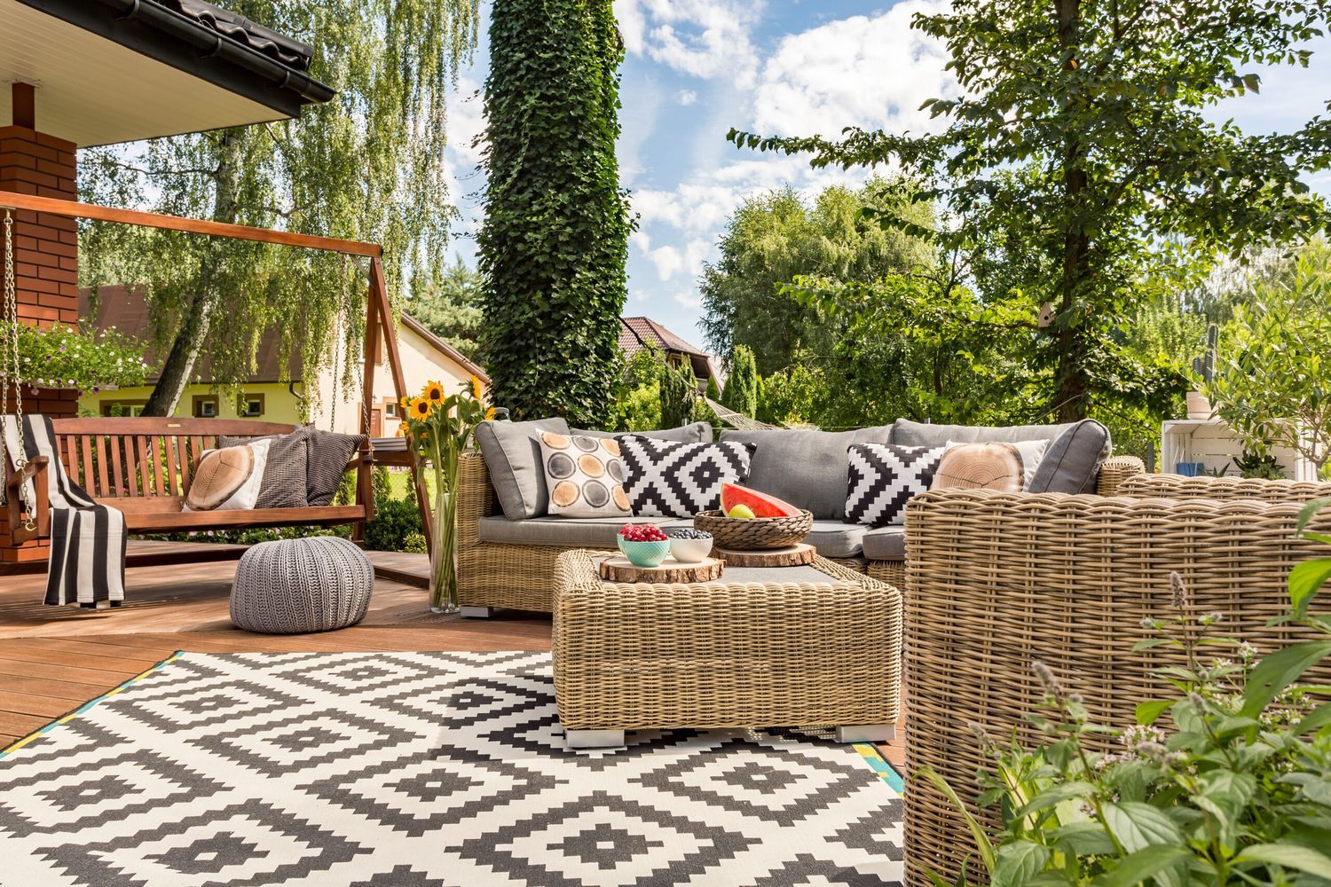 an outdoor patio with furniture