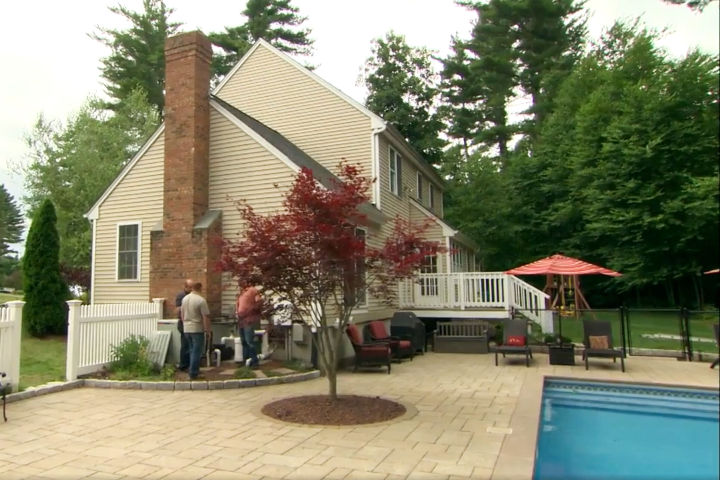 House with an outdoor pool.