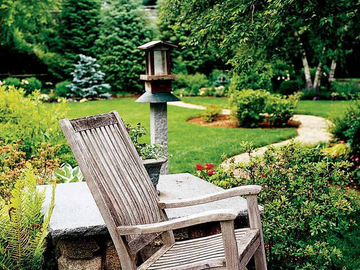 Wooden chair in backyard garden