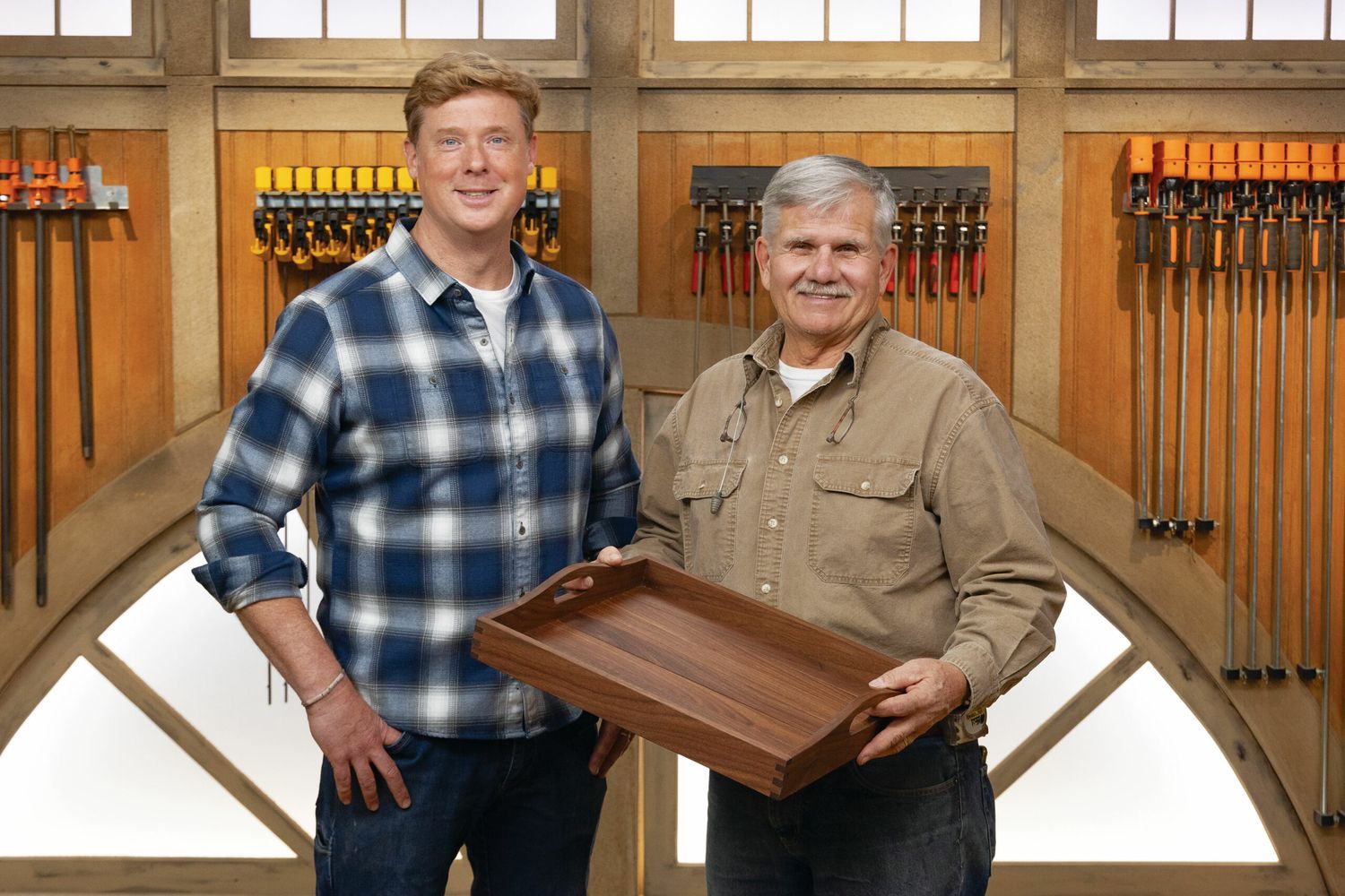 Tom Silva and Kevin O’Connor posing with their finished walnut serving tray.
