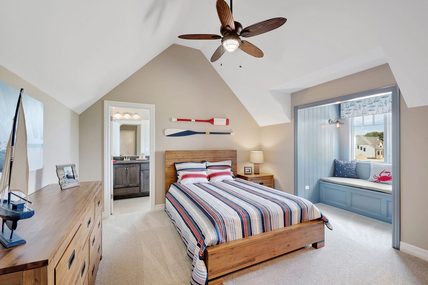 a bedroom with a ceiling fan and shades to help keep it cool