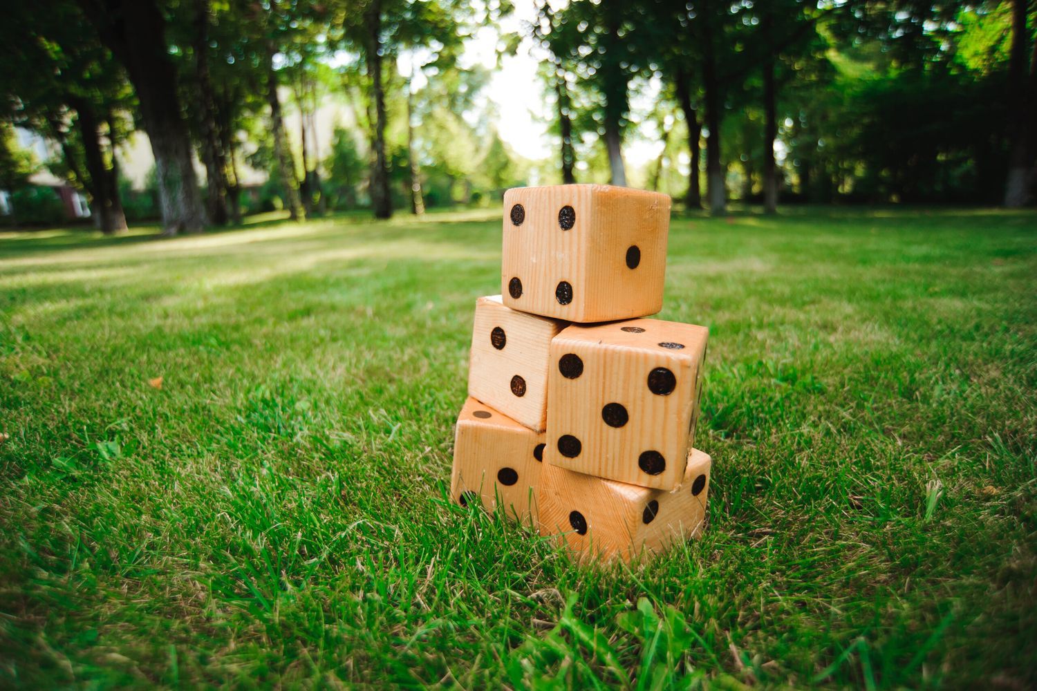 large lawn dice stacked up