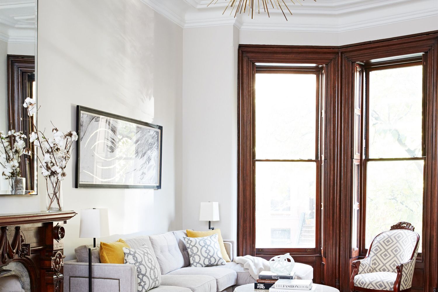 a room with greige colored walls and nice furniture