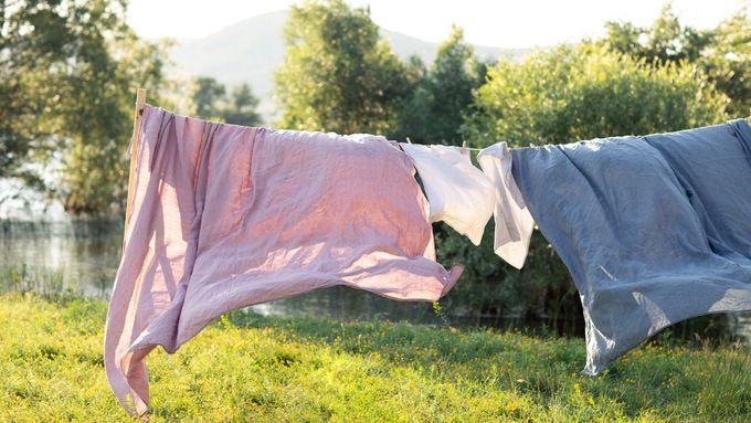 Laundry hanging outside on a line to dry.