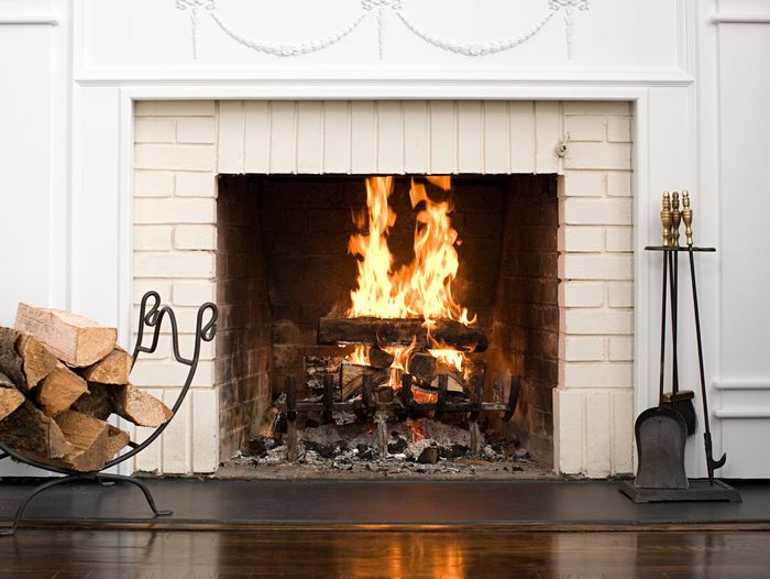 A rumford fireplace ina living room.