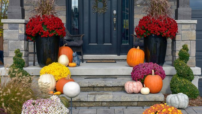 Porch decorated for fall.