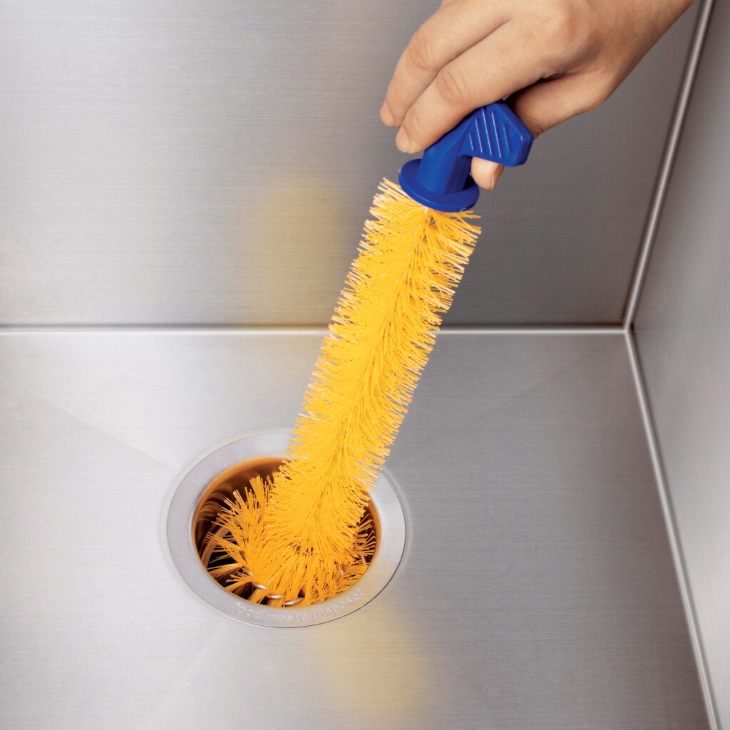 Garbage disposal scrubbing brush