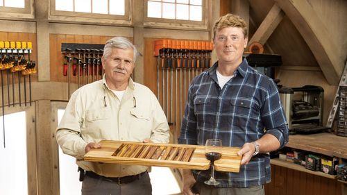 Kevin O'Connor and Tom Silva holding a finished bath tray