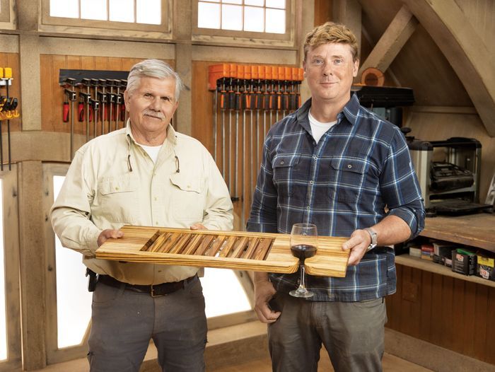 Kevin O'Connor and Tom Silva holding a finished bath tray