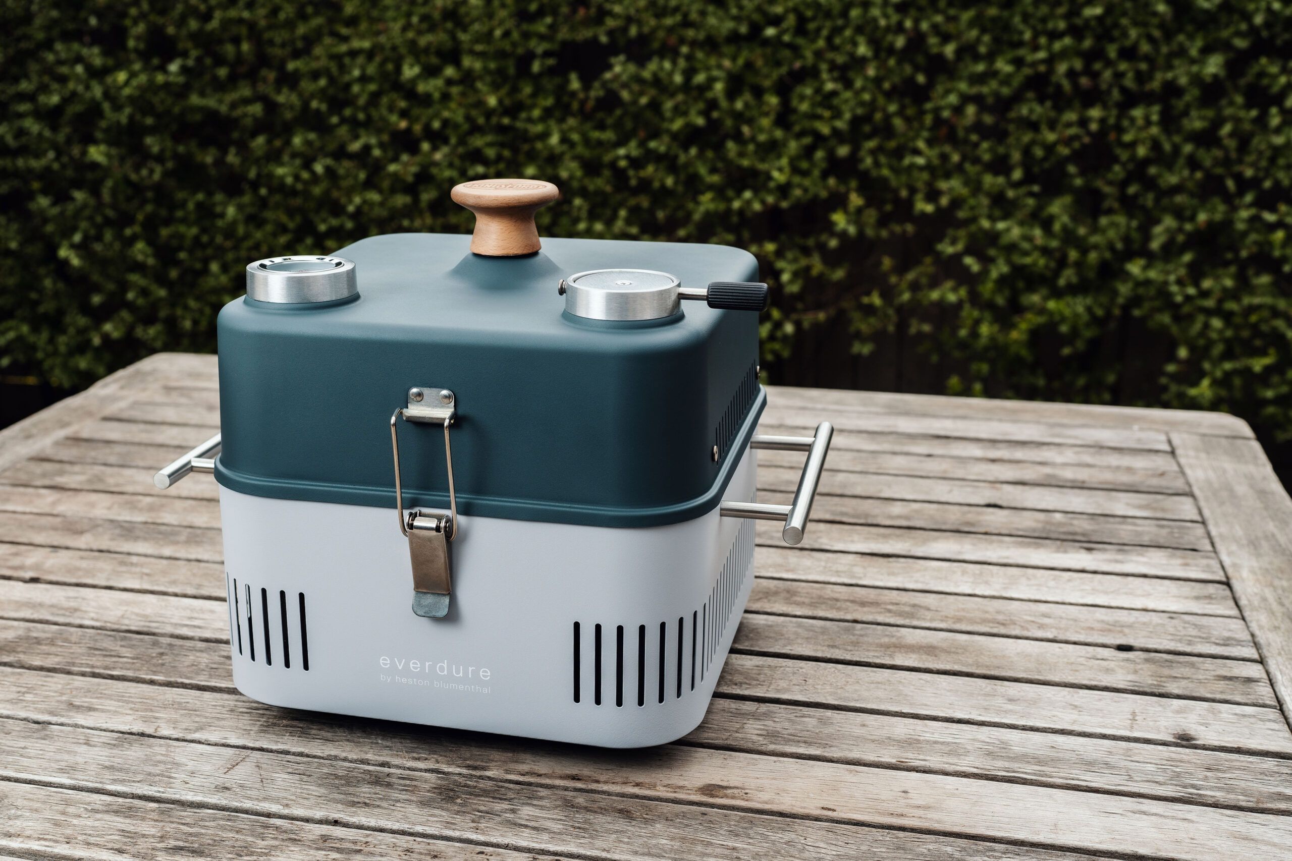 Small cube grill on picnic table