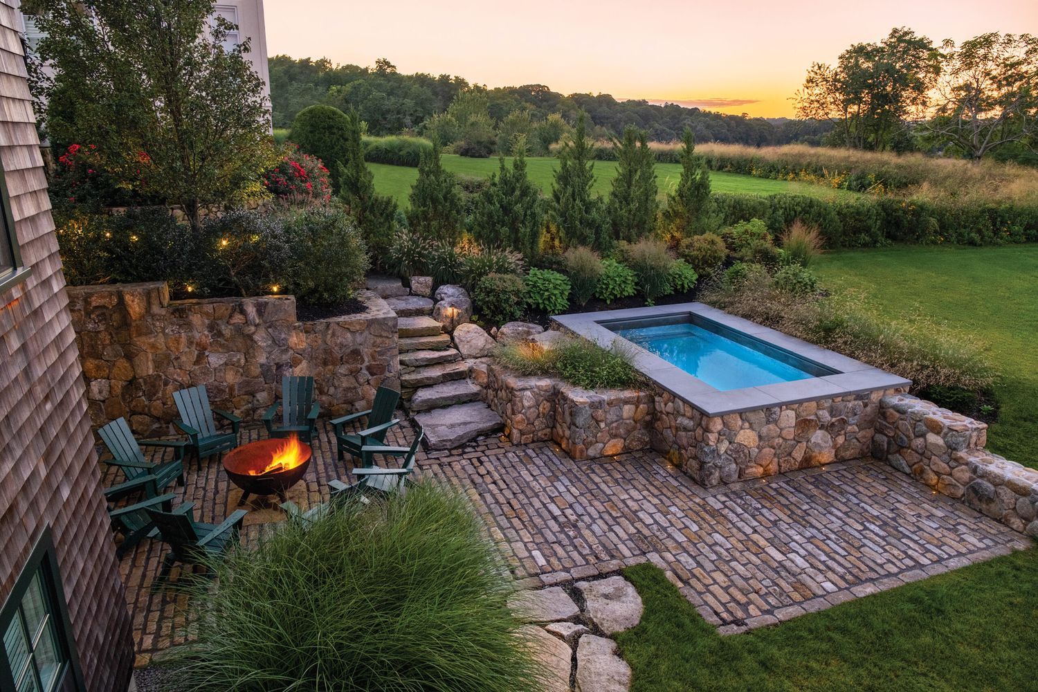 A plunge pool with a stone finish