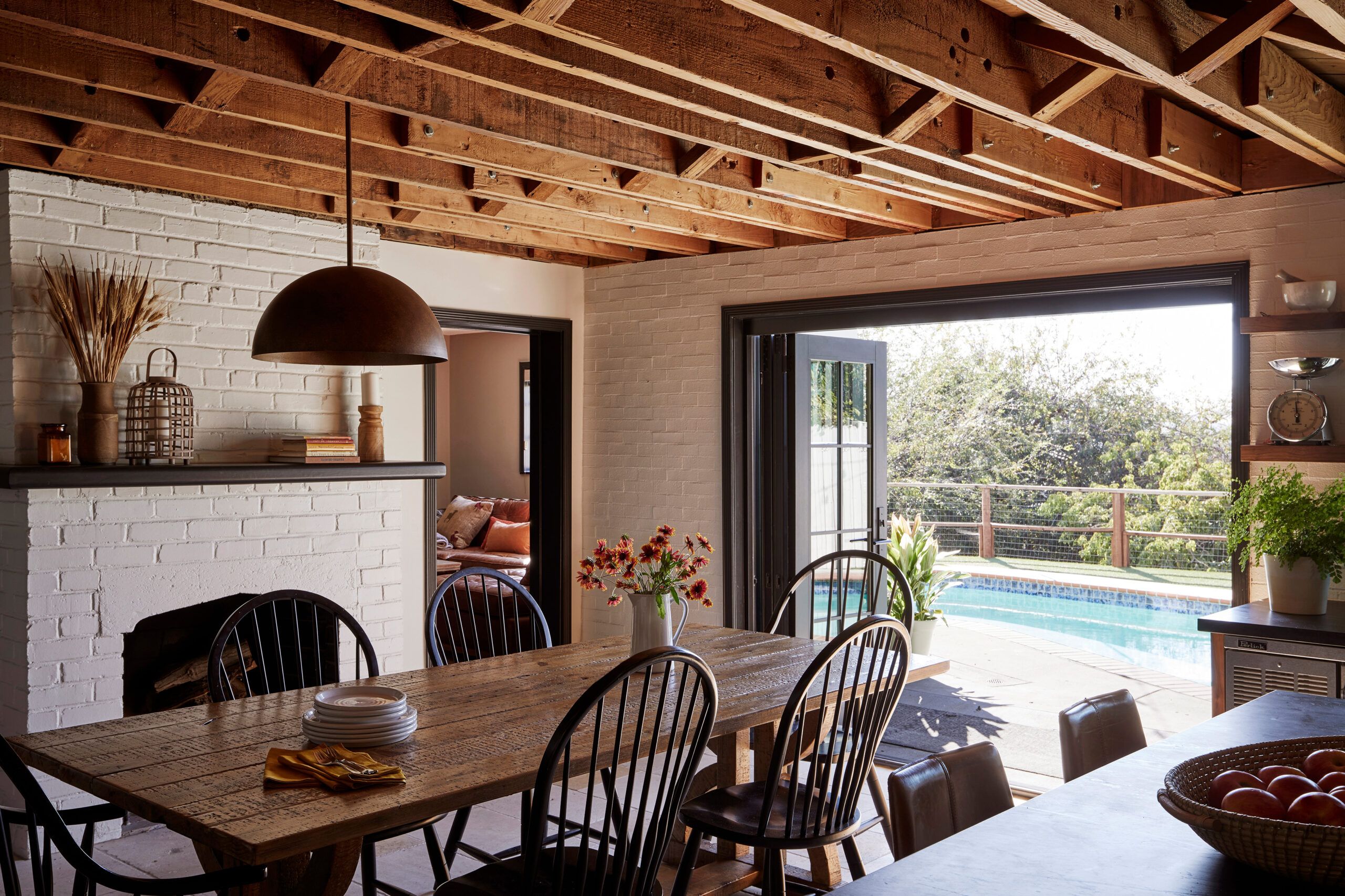 Dining room with a dome lighting fixture over the table