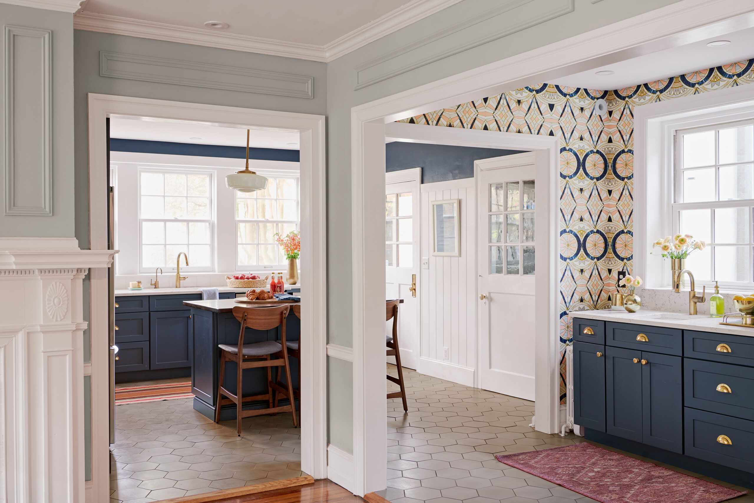 Kitchen with multiple doorways displaying casing