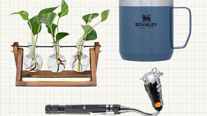 RENMXJ Plant Propagation Station, Stanley Stay Hot Camp Mug, and Dream Master Store Magnetic Pickup Tool isolated on a tan grid paper background