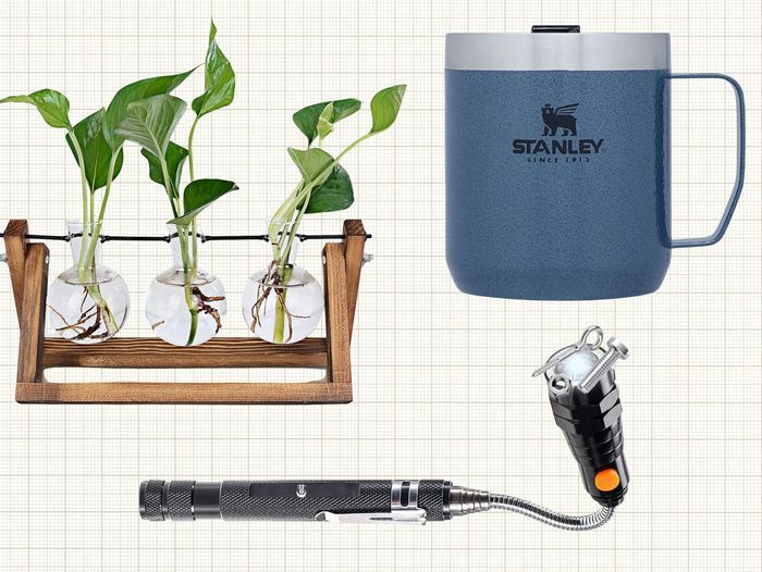 RENMXJ Plant Propagation Station, Stanley Stay Hot Camp Mug, and Dream Master Store Magnetic Pickup Tool isolated on a tan grid paper background