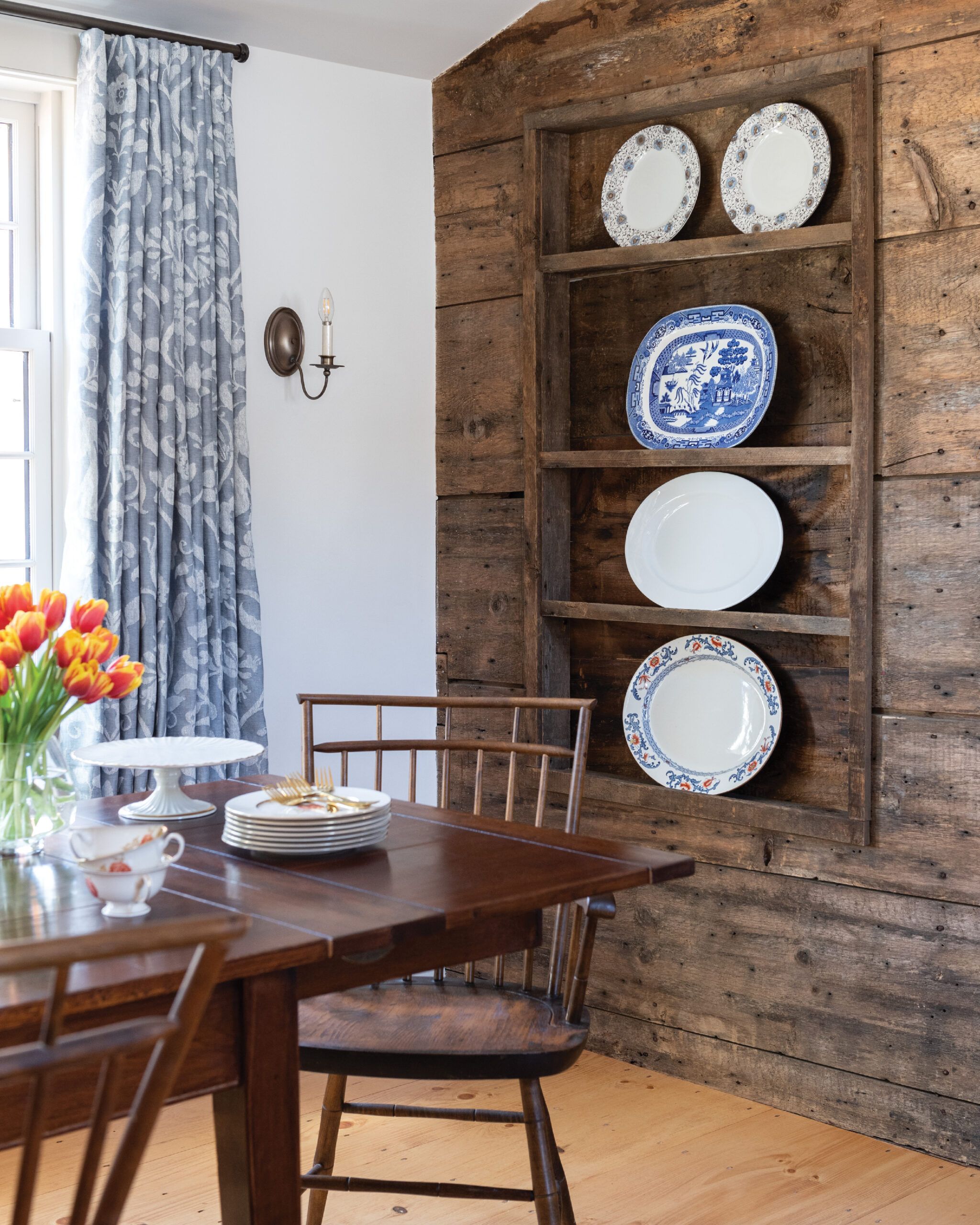 A traditional sconce in a dining room