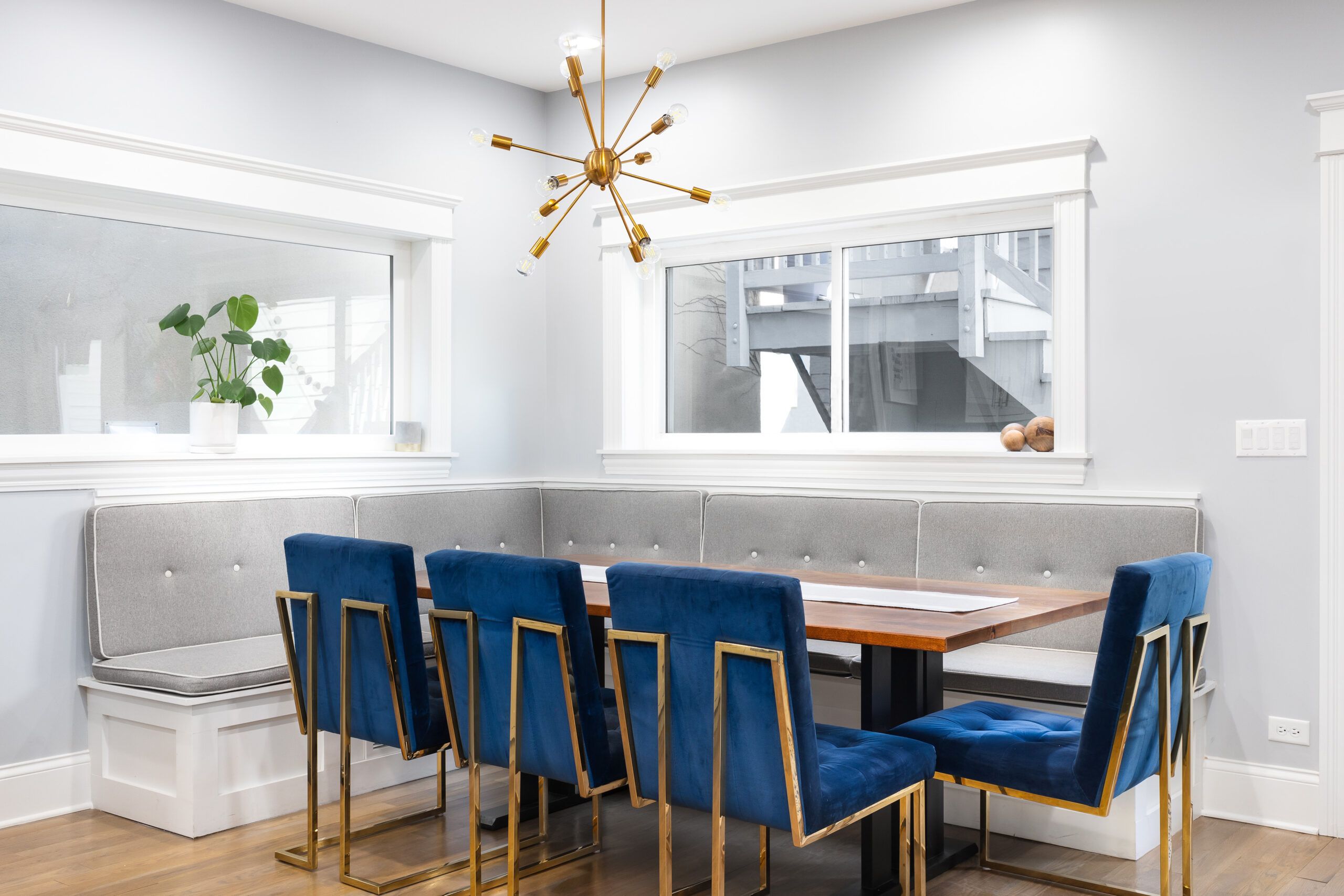 Modern dining area with Sputnik lighting