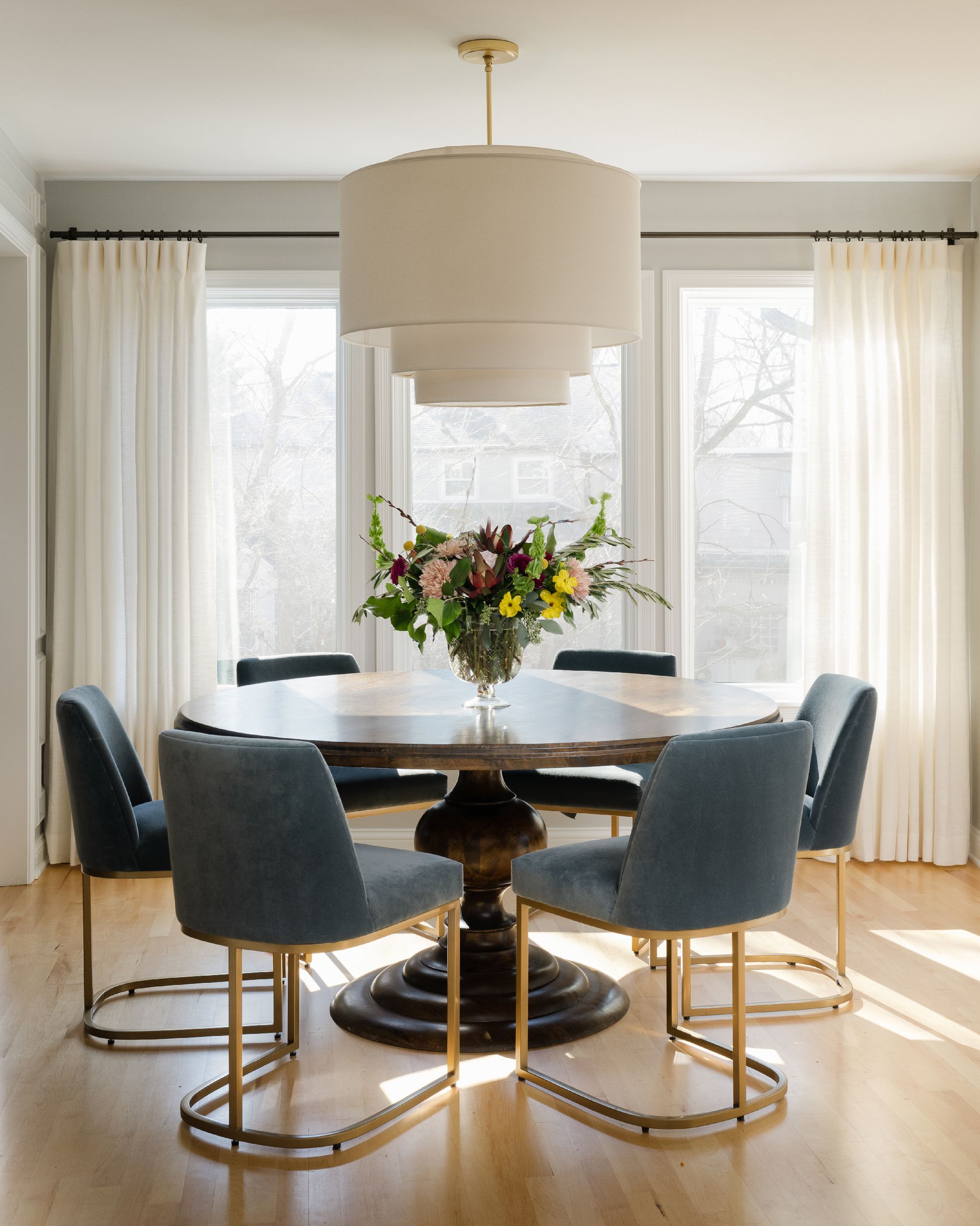 Modern dining room with a waterfall chandelier 