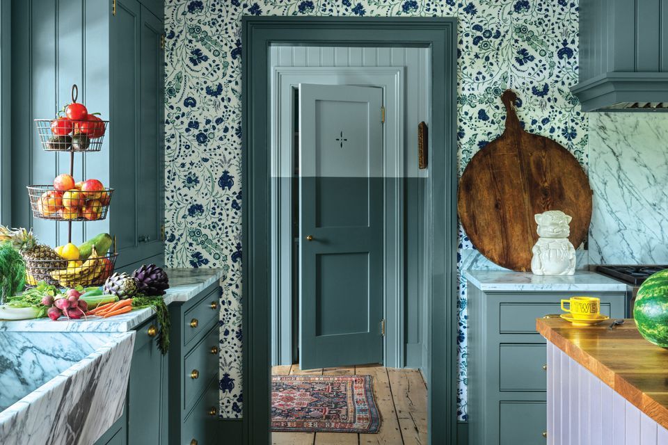 Looking through the kitchen at a two tone door