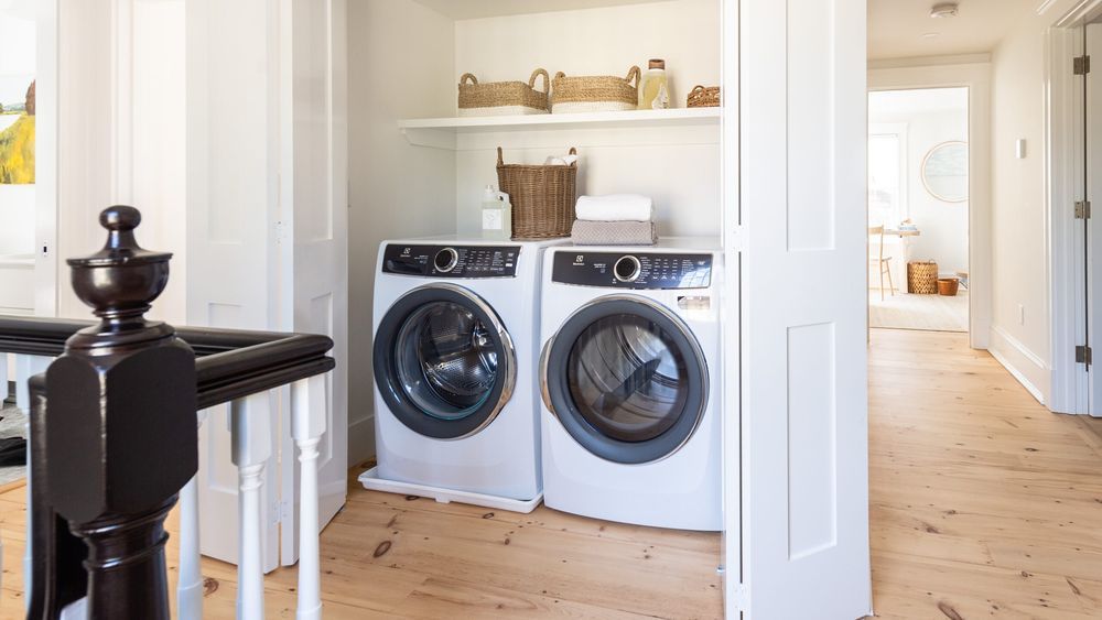 Washer and Dryer in an upstairs closet