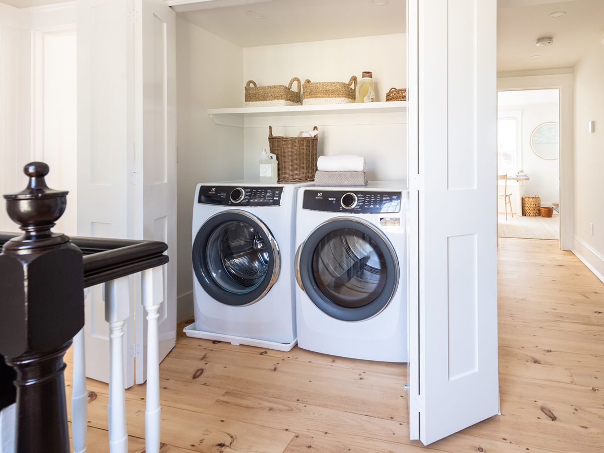 Washer and Dryer in an upstairs closet