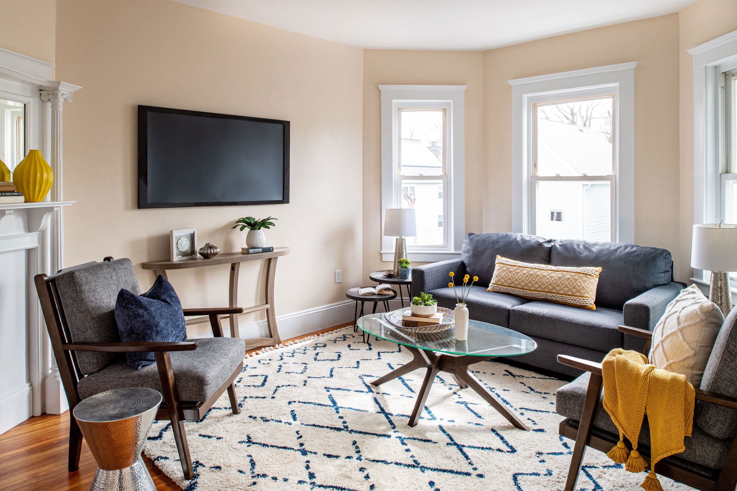 Living Room with small furniture and mounted TV