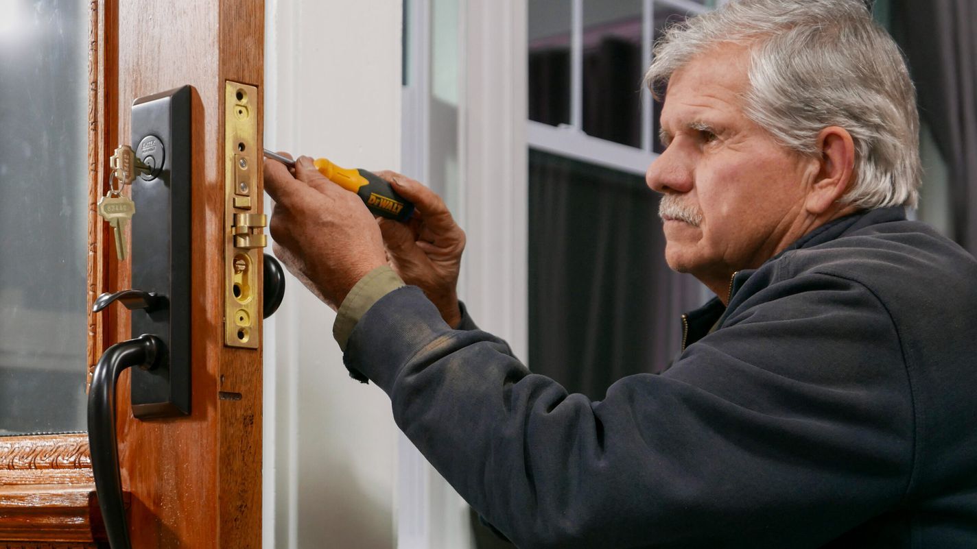 Tom Silva adding a lock to an antique door