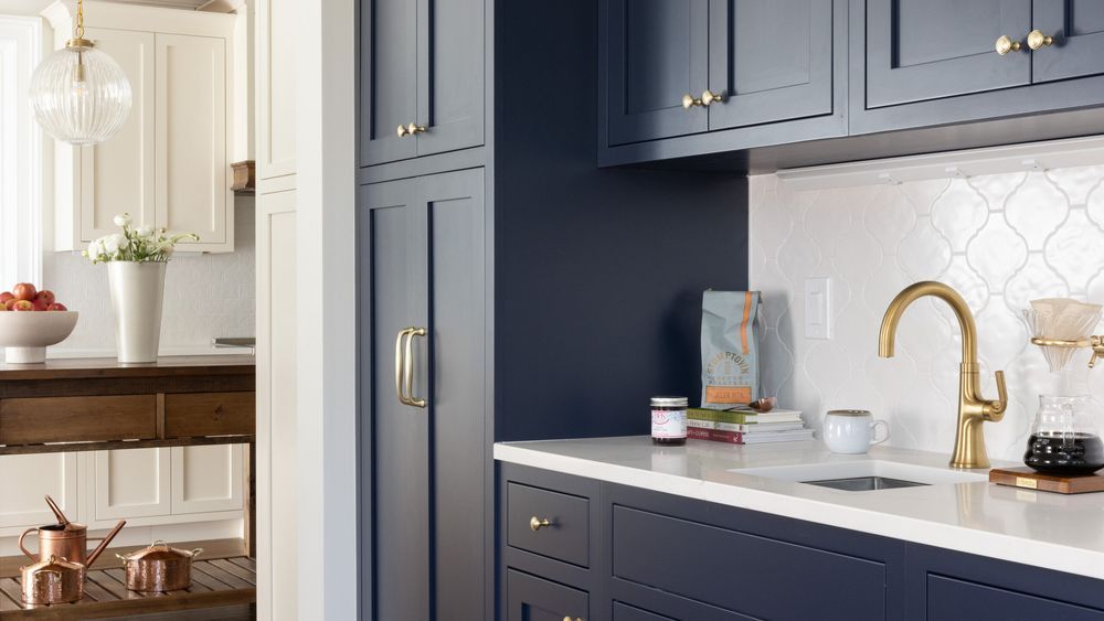 Kitchen with blue and white cabinets