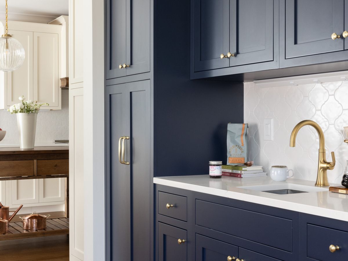 Kitchen with blue and white cabinets