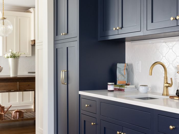 Kitchen with blue and white cabinets