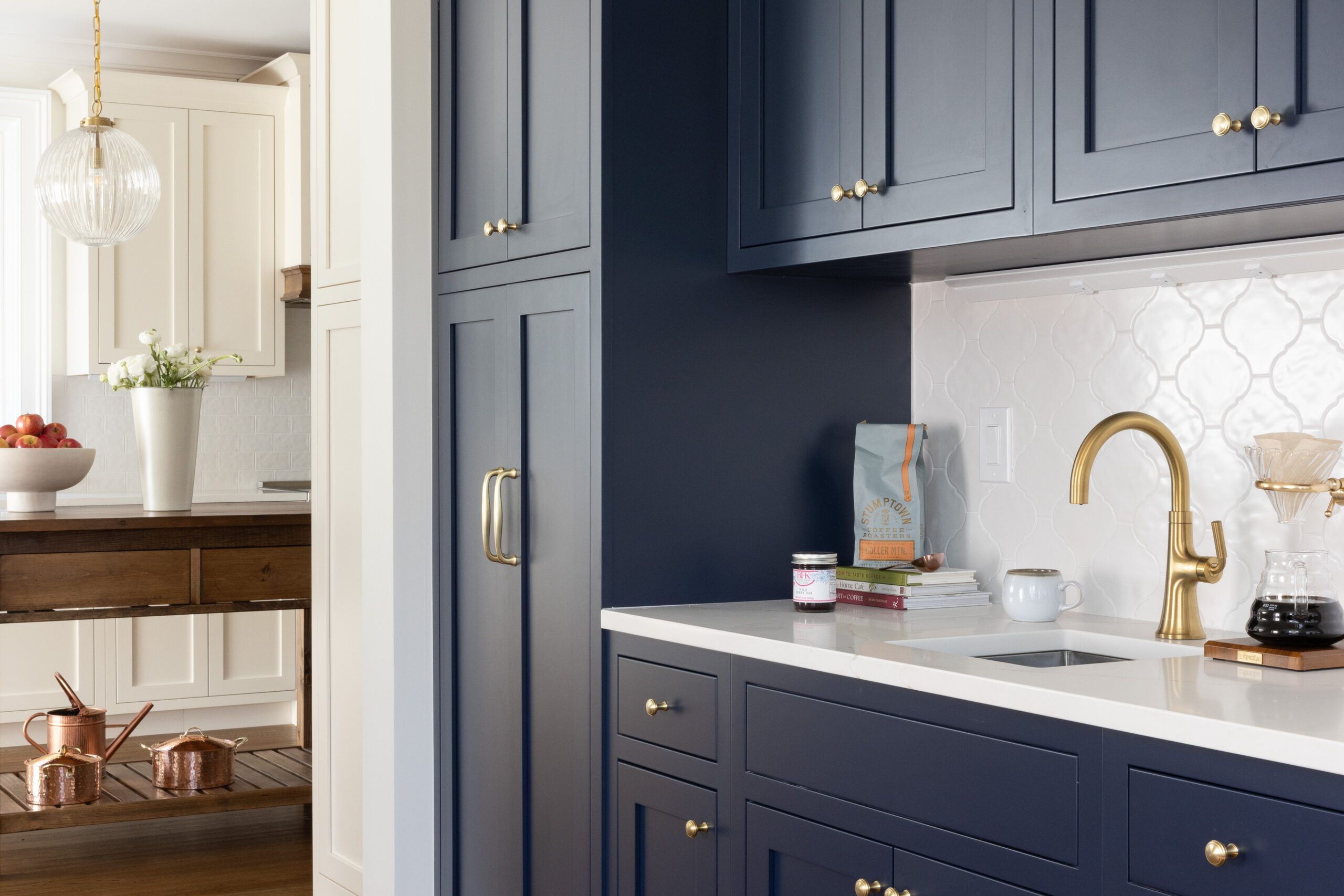 Kitchen with blue and white cabinets