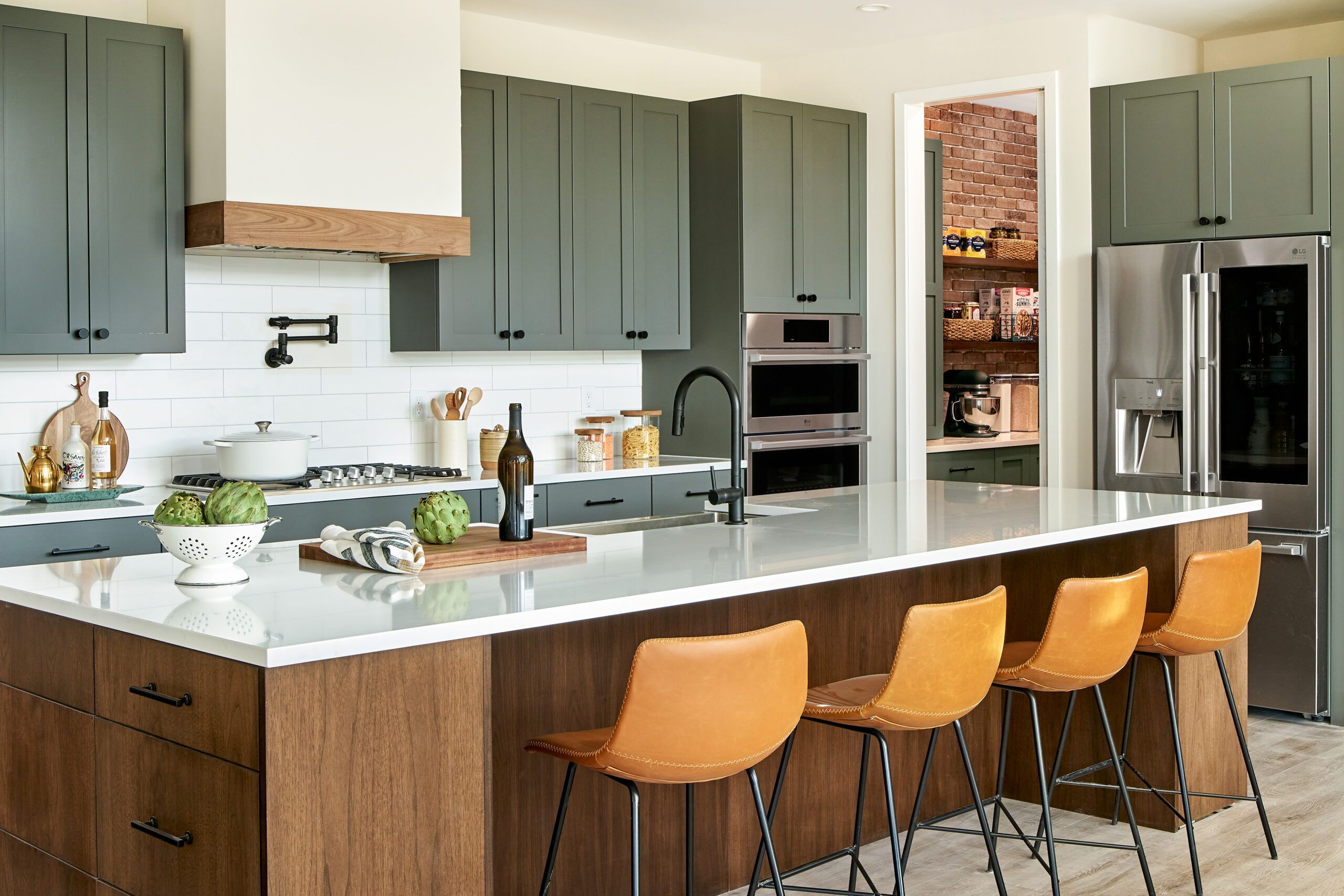 Kitchen with sage green cabinets